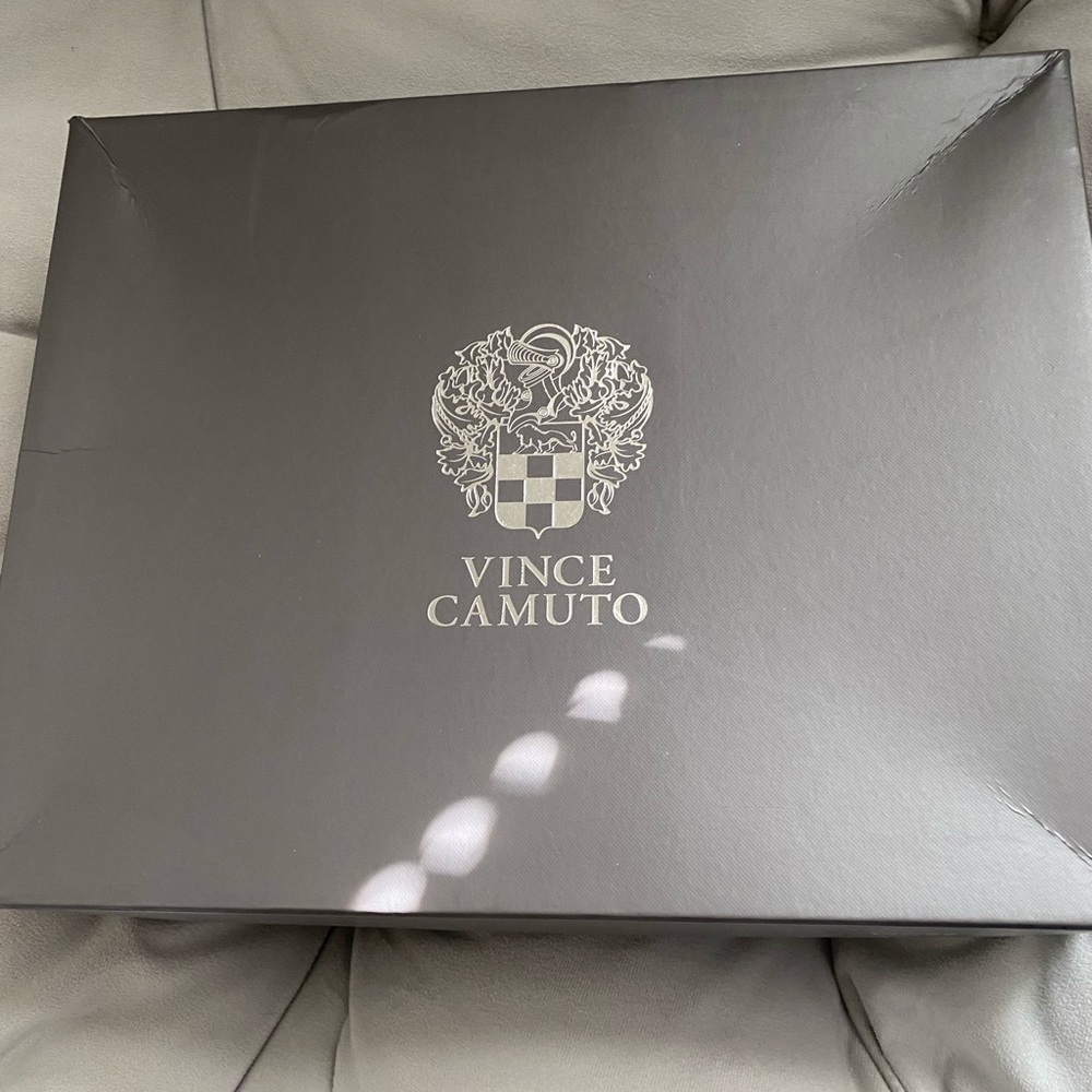Never Worn. Vince Camuto Booties with box. Just bought the wrong size.
